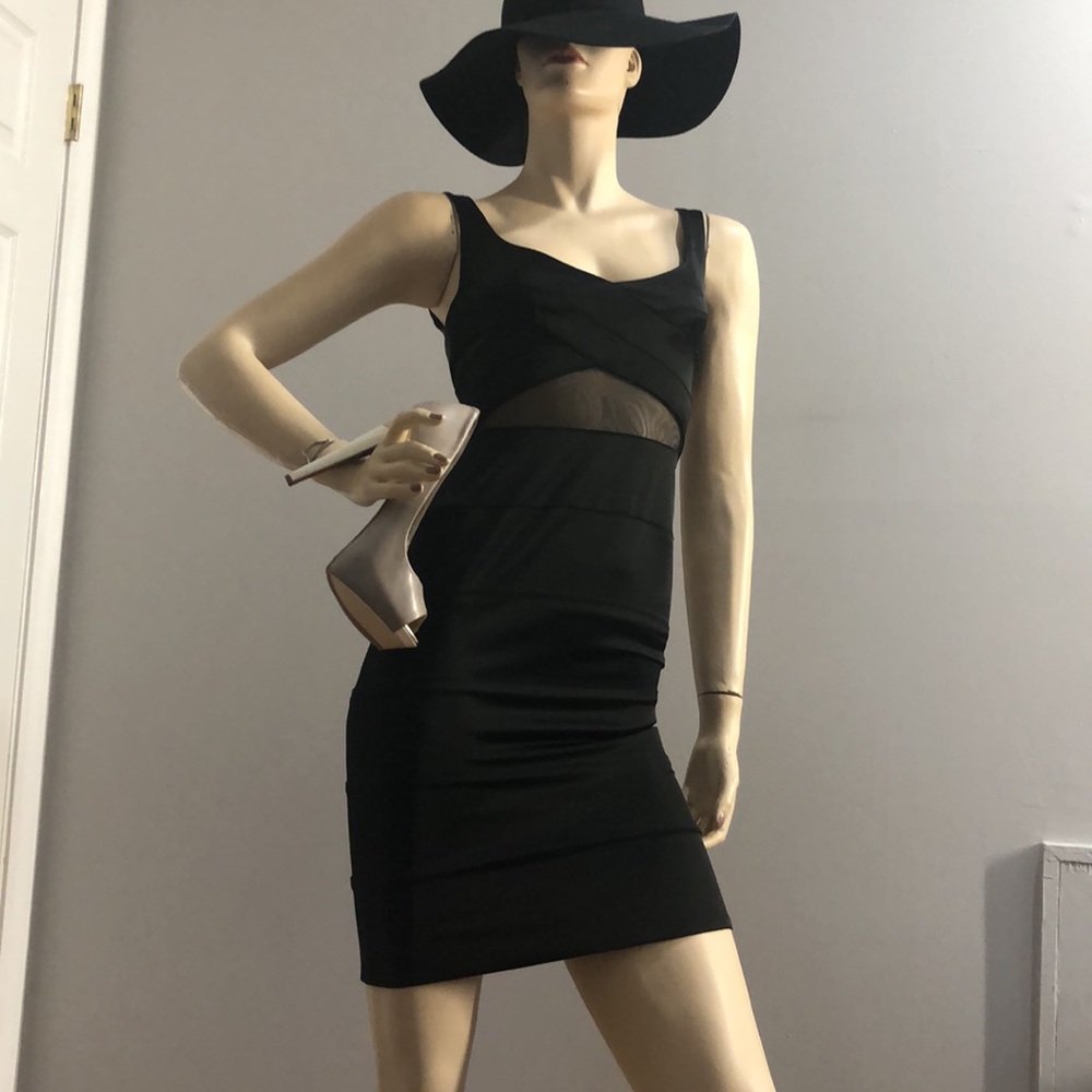 NWT.BEBE AILEEN Dress, Top. Size XXS. Color Black.
